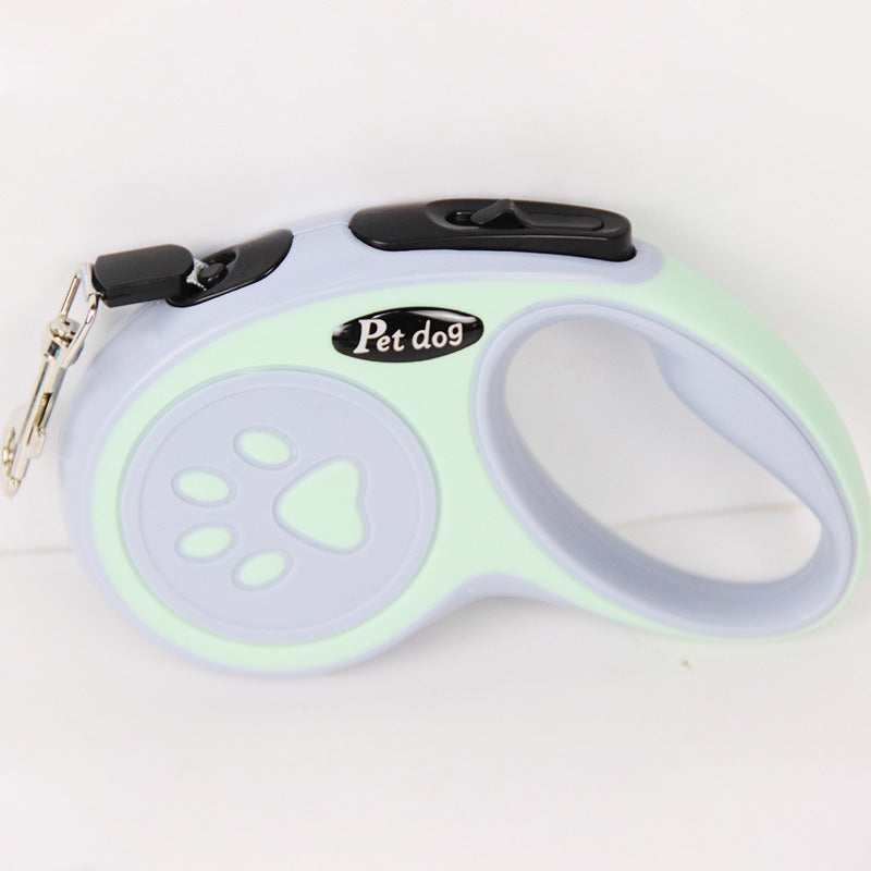 Pet dog retractable leash with paw design on a white background