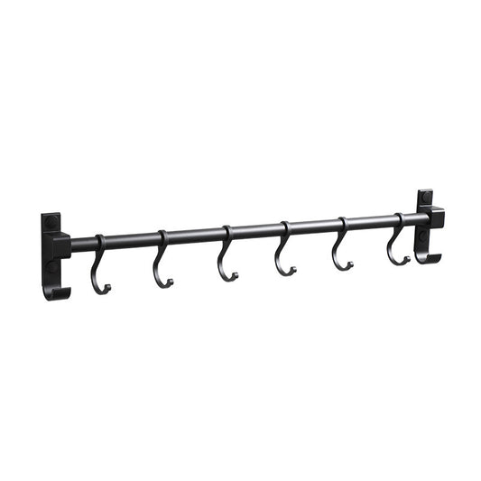 Black metal curtain rod with hooks on a white background