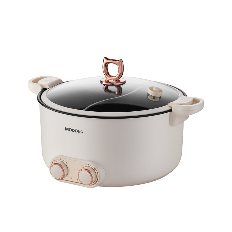White electric pot with rose gold accents on a white background