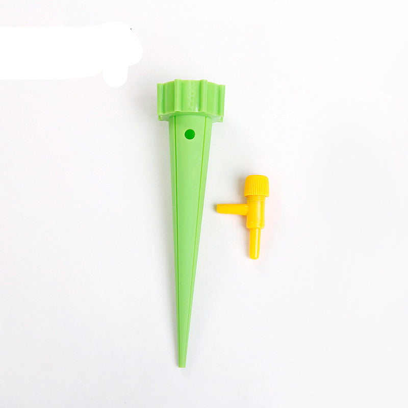 Green plastic plant waterer with yellow valve on a white background, labeled '12PCS'.