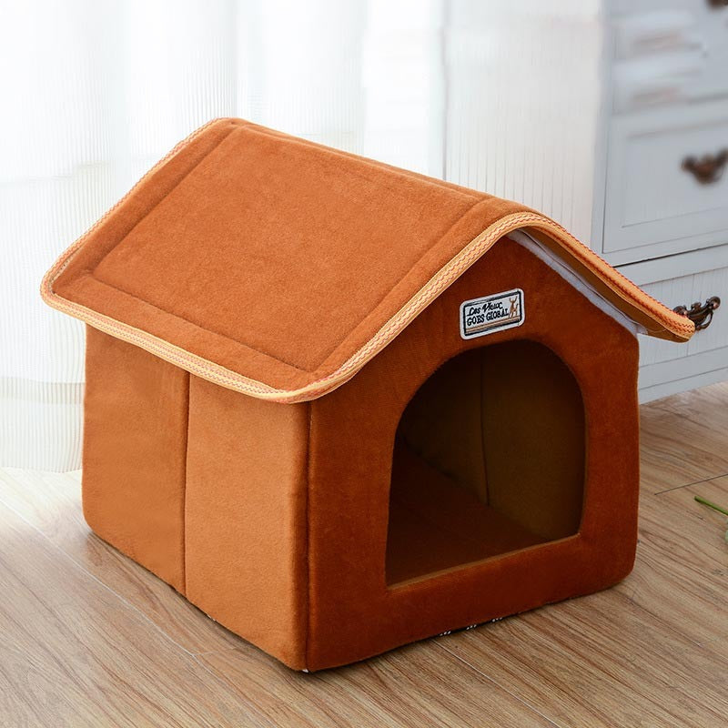 Brown pet house on a wooden floor with a blurred background
