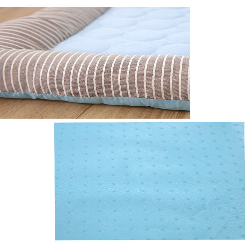 Collage of striped fabric and blue quilted surface