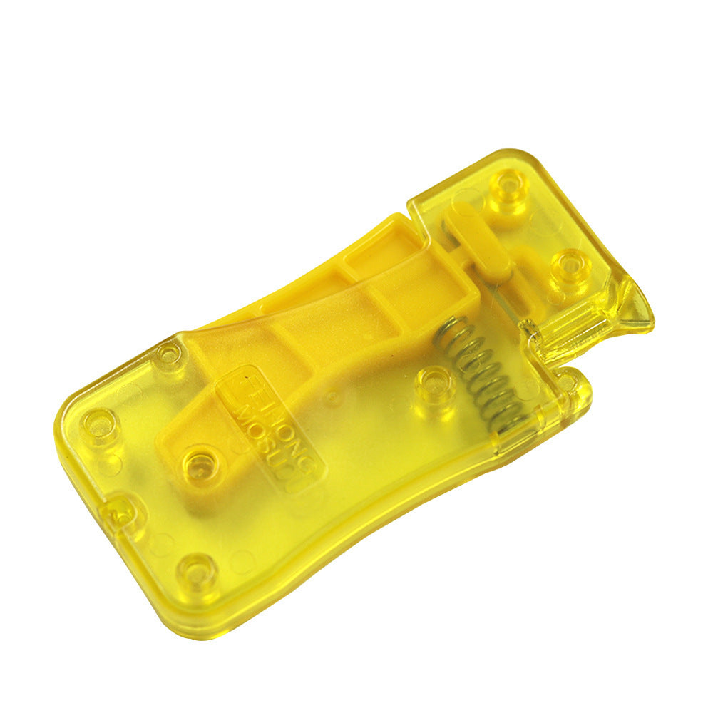 Yellow plastic component on a white background