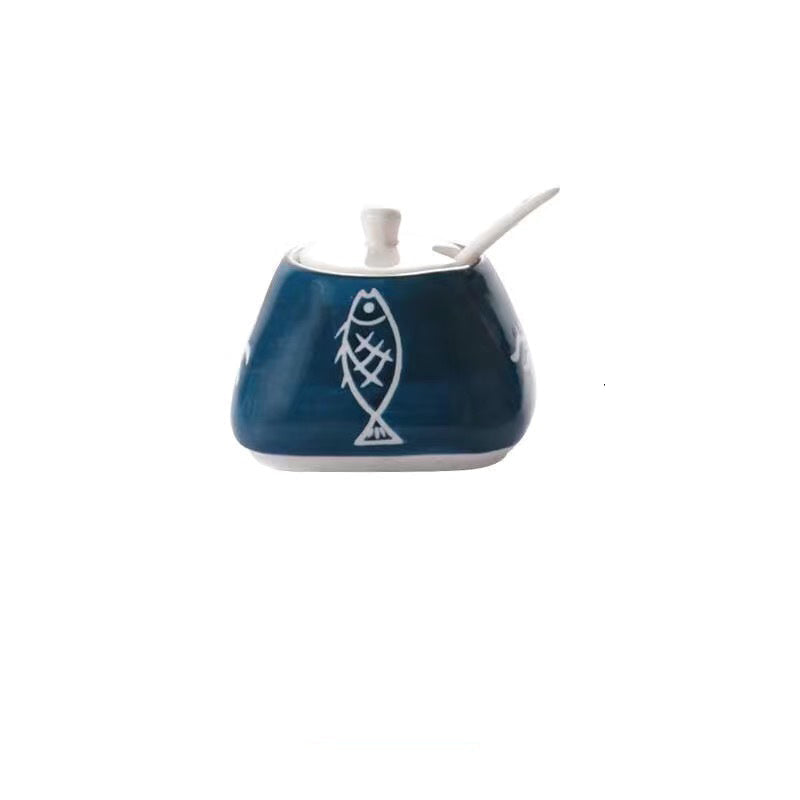 Blue ceramic container with fish design and dimensions on a white background