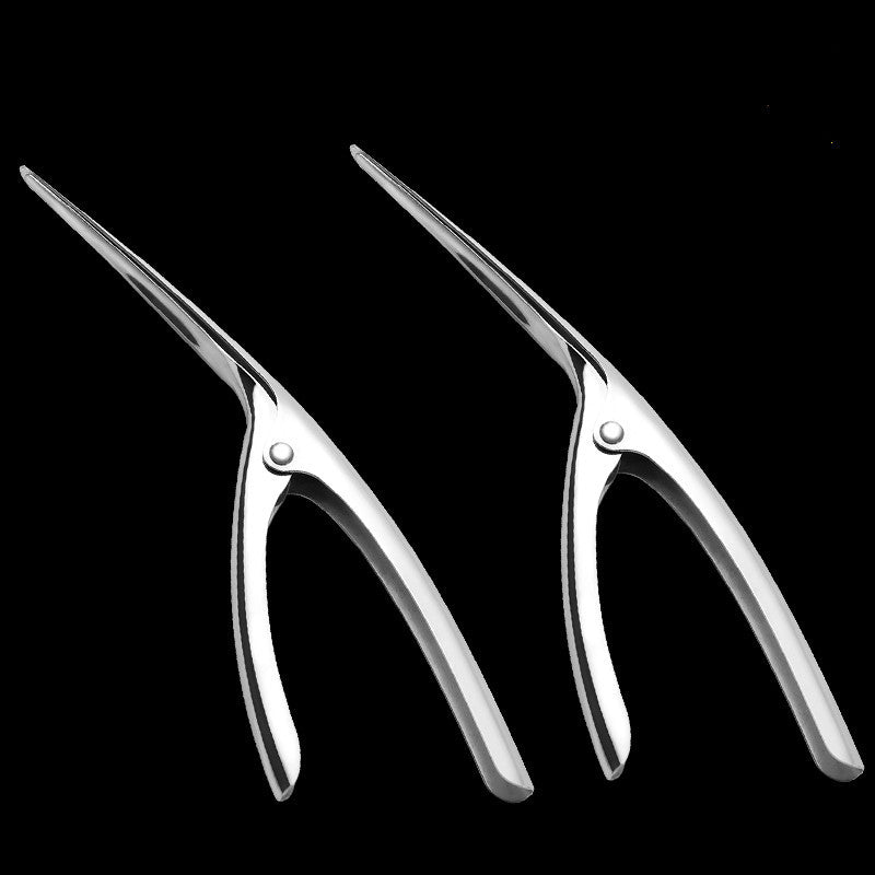 Pair of silver pliers on a black background
