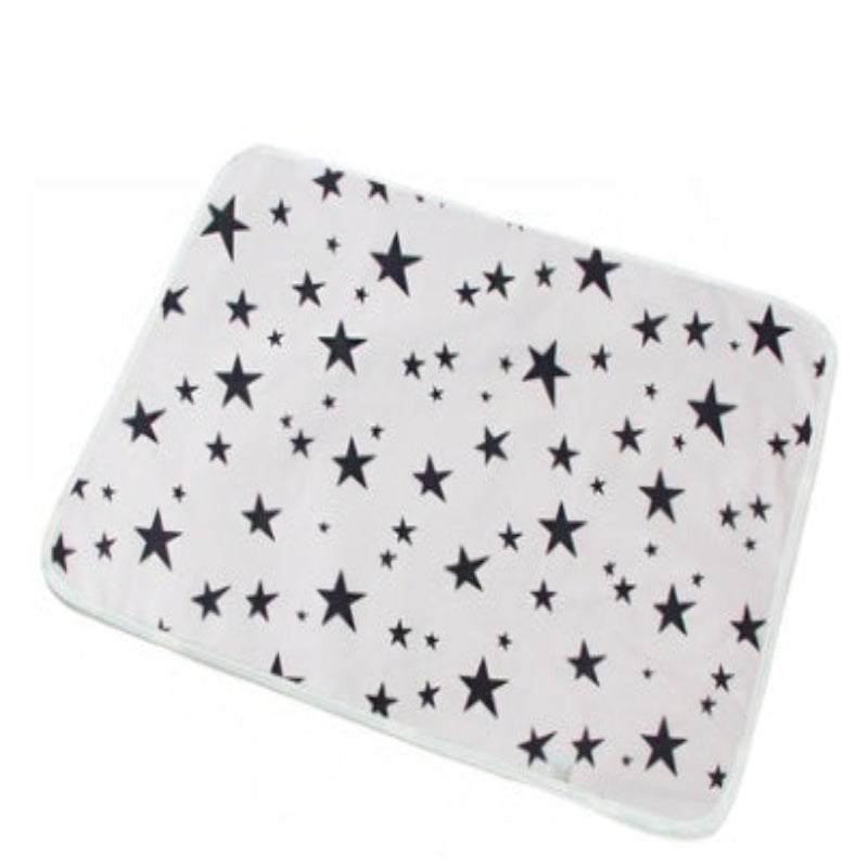 White mat with black star pattern on a white background
