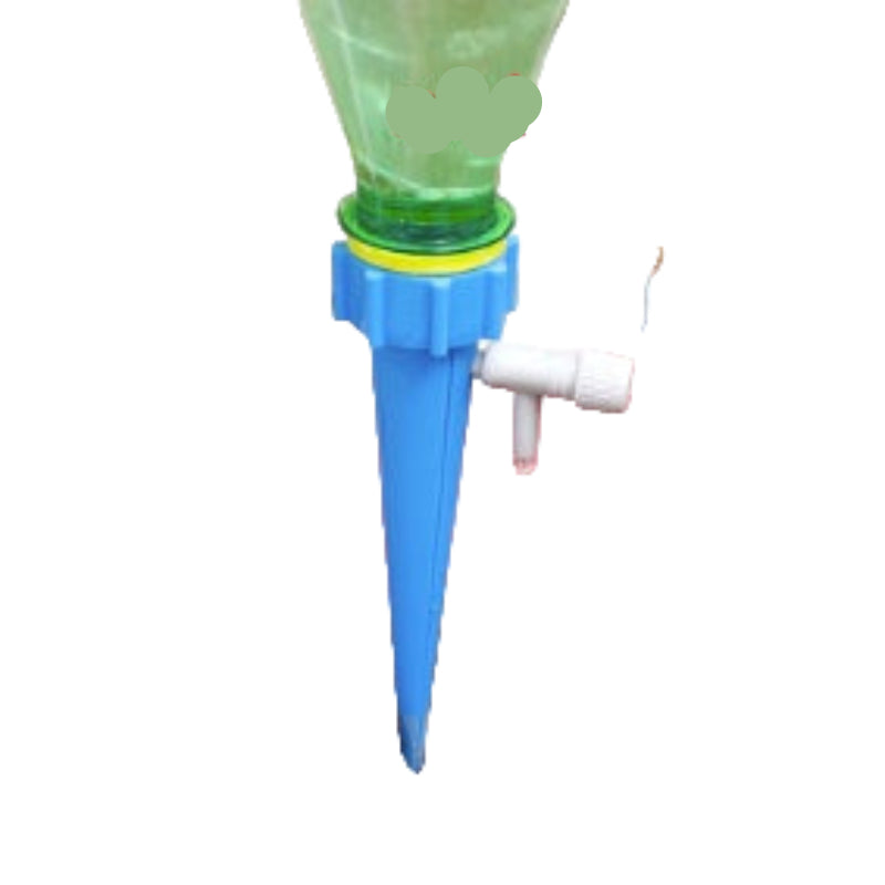 Plants in pots with a blue and green watering device on a blurred background