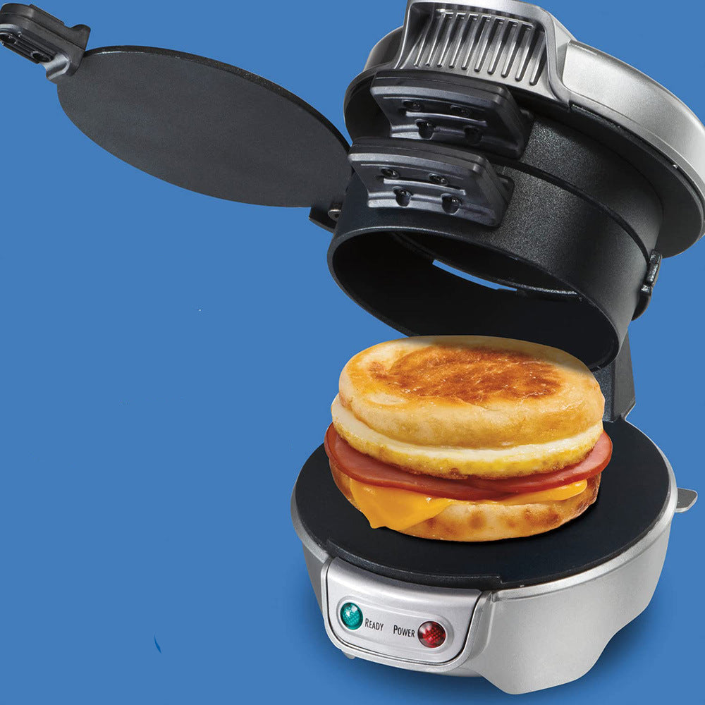 Breakfast sandwich maker with a sandwich inside on a blue background