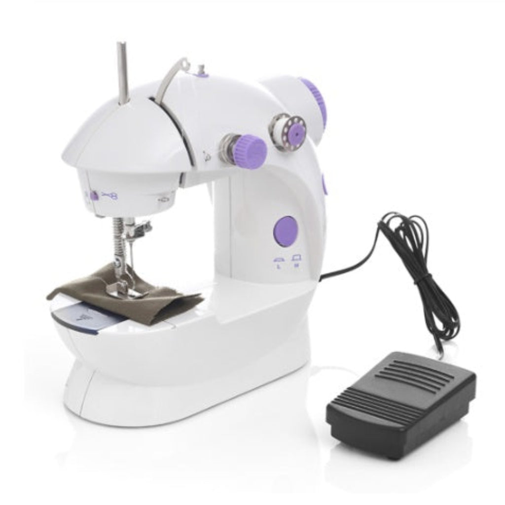 White sewing machine with purple controls on a white background