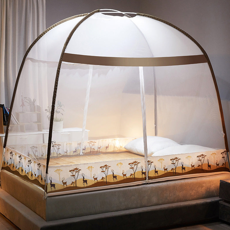 Bed with a mosquito net in a bedroom setting