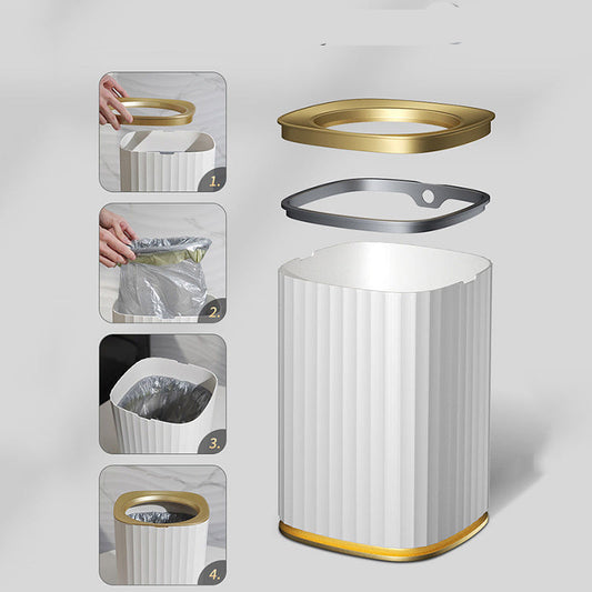 White trash bin with gold accents and a lid showing how to hide a garbage bag.