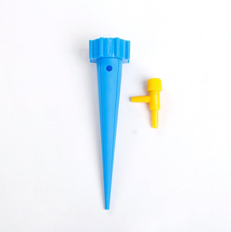 Blue and yellow plastic spike on a white background