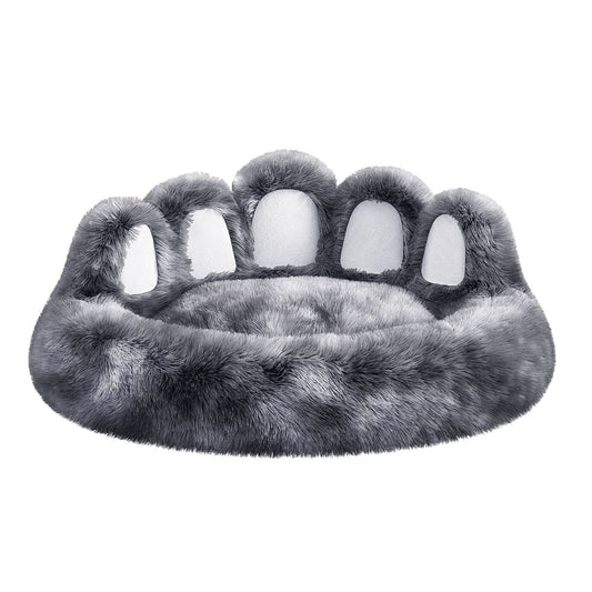Gray paw-shaped pet bed on a white background