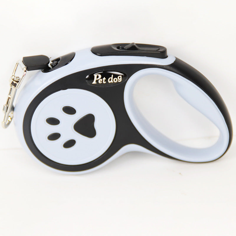 Black and white pet leash with paw design on a white background