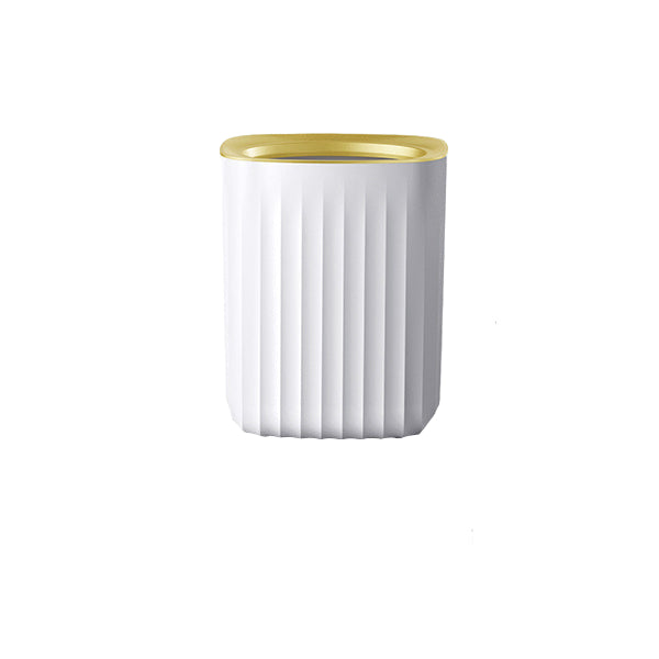 White ceramic mug with gold rim on a white background