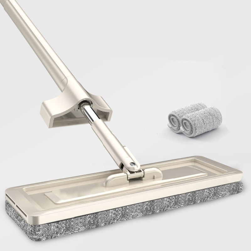 Cleaning scraper with two additional scraping pads on a light gray background