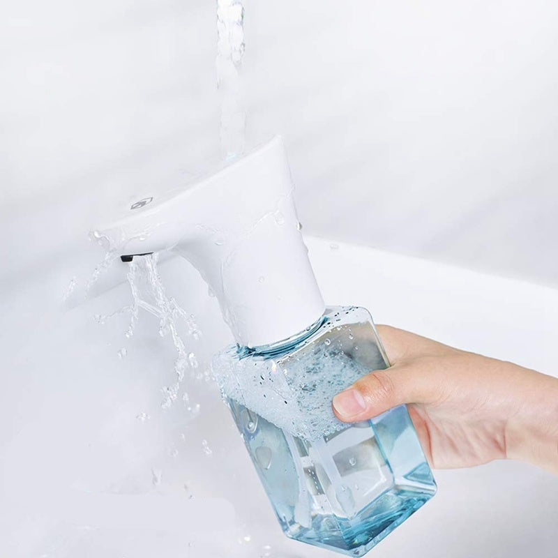 Hand holding a blue glass with water being poured from a faucet, with text indicating bathroom usage.