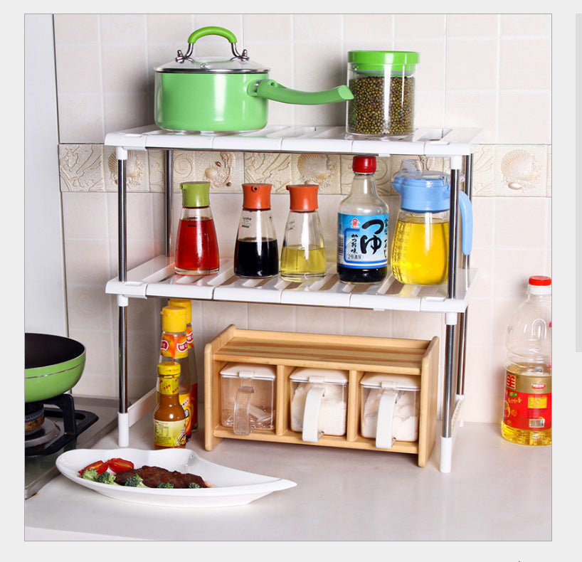 Kitchen shelf with various items including a green pot, bottles, and a wooden rack.
