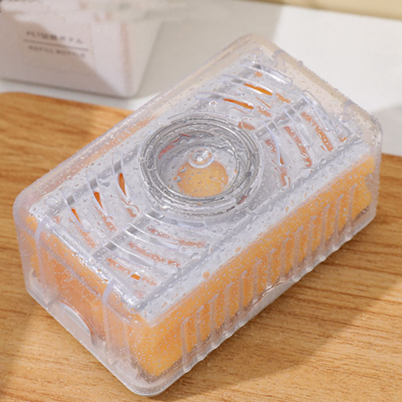 Clear plastic container with a circular component on a wooden surface
