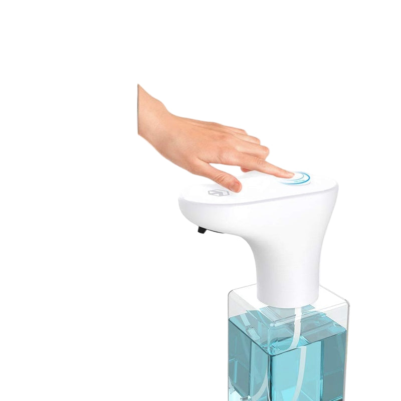 Hand pressing a white soap dispenser with blue liquid inside, on a light gray background.