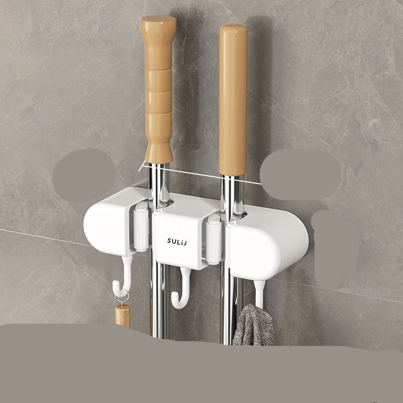 Shower head and holder with measurements on a tiled wall background