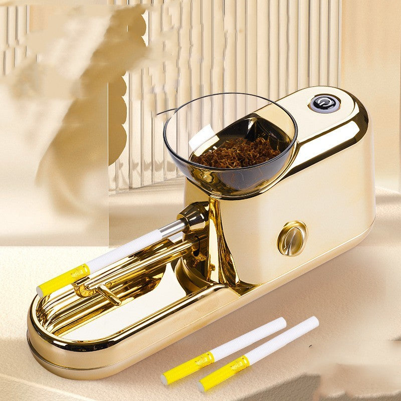 Gold-colored smoking accessory with tobacco and cigarettes on a beige surface
