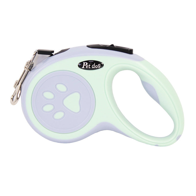 Retractable dog leash with paw design on a white background