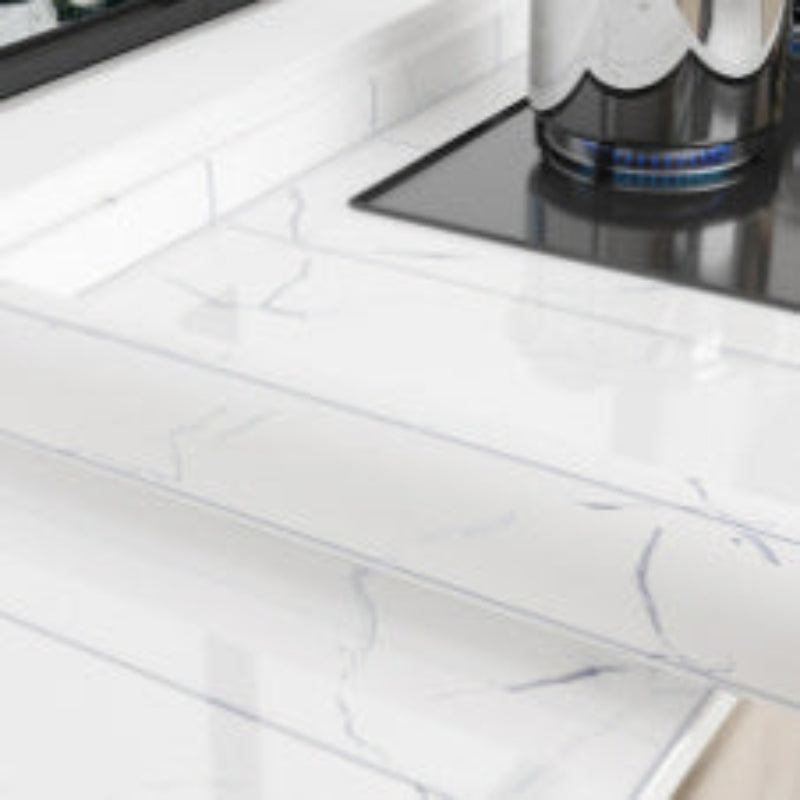Close-up of a kitchen countertop with a marble pattern