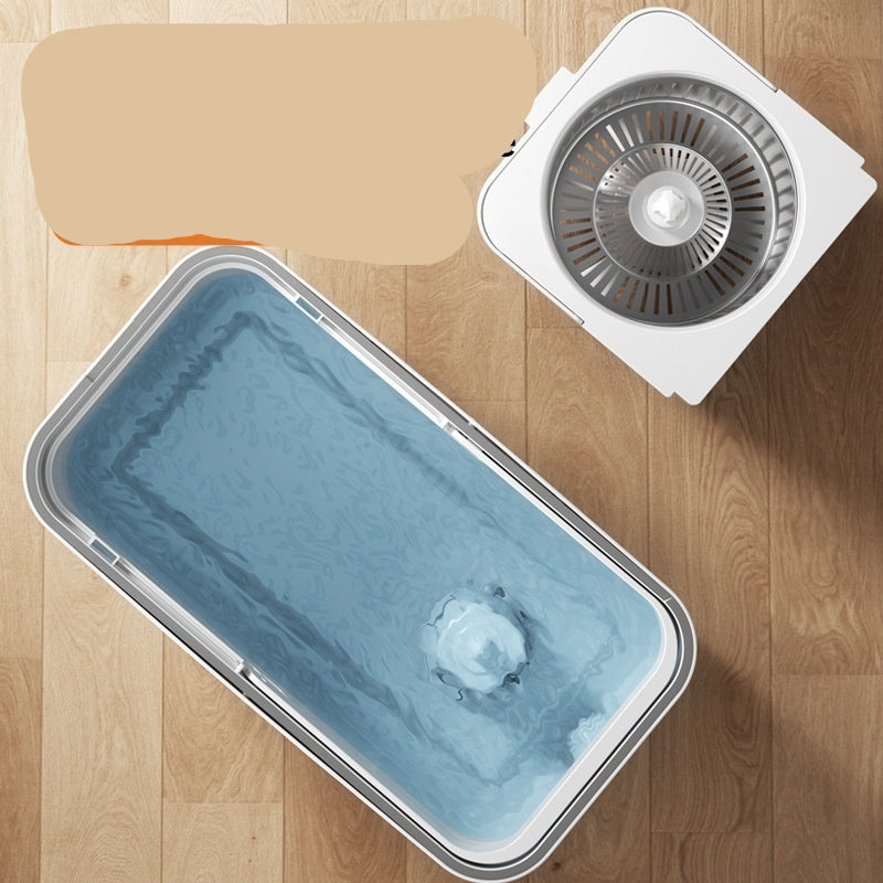 High efficiency centrifugal water mop with clean and dirty separation feature on a wooden floor.
