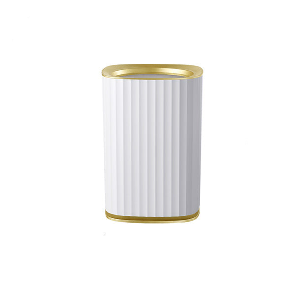 White cylindrical container with gold rim on a white background