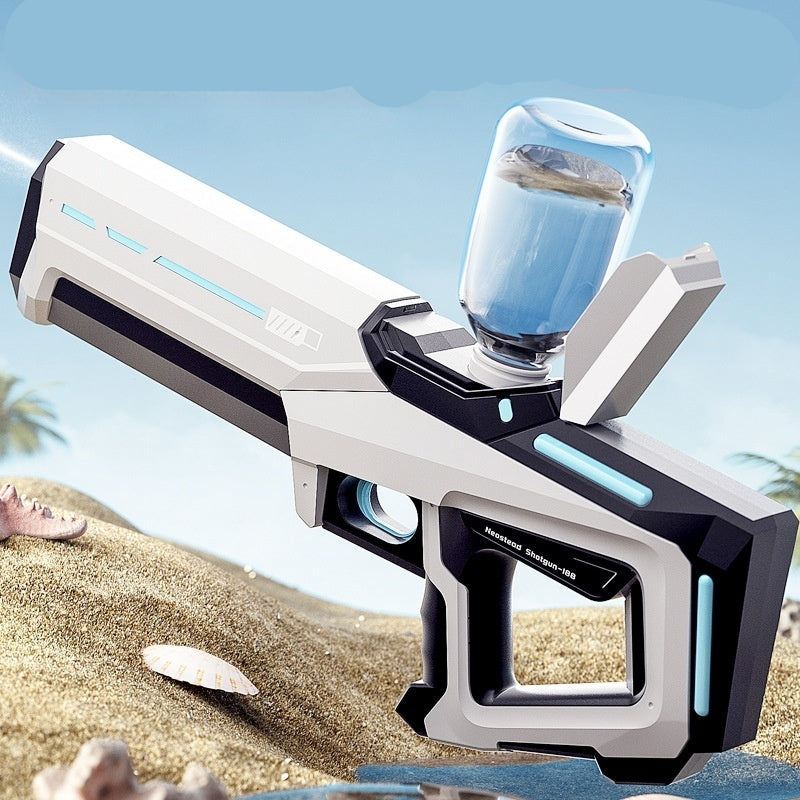 Electric water gun with a glass of water on a beach background