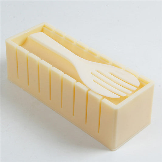 Rectangular soap with a fork and knife cutout on a light gray background