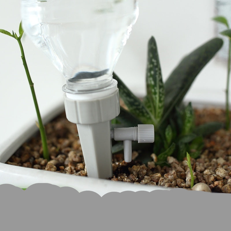 Automatic watering system for plants using a drink bottle, with text indicating compatibility with mineral water bottles.