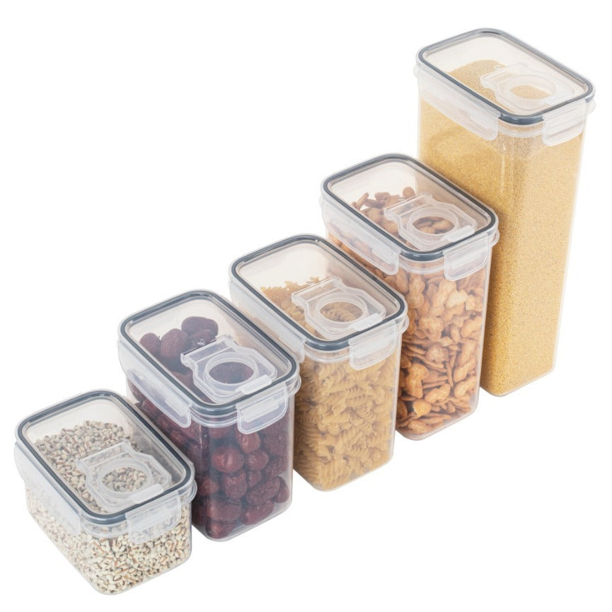 Set of clear food storage containers with lids on a white background