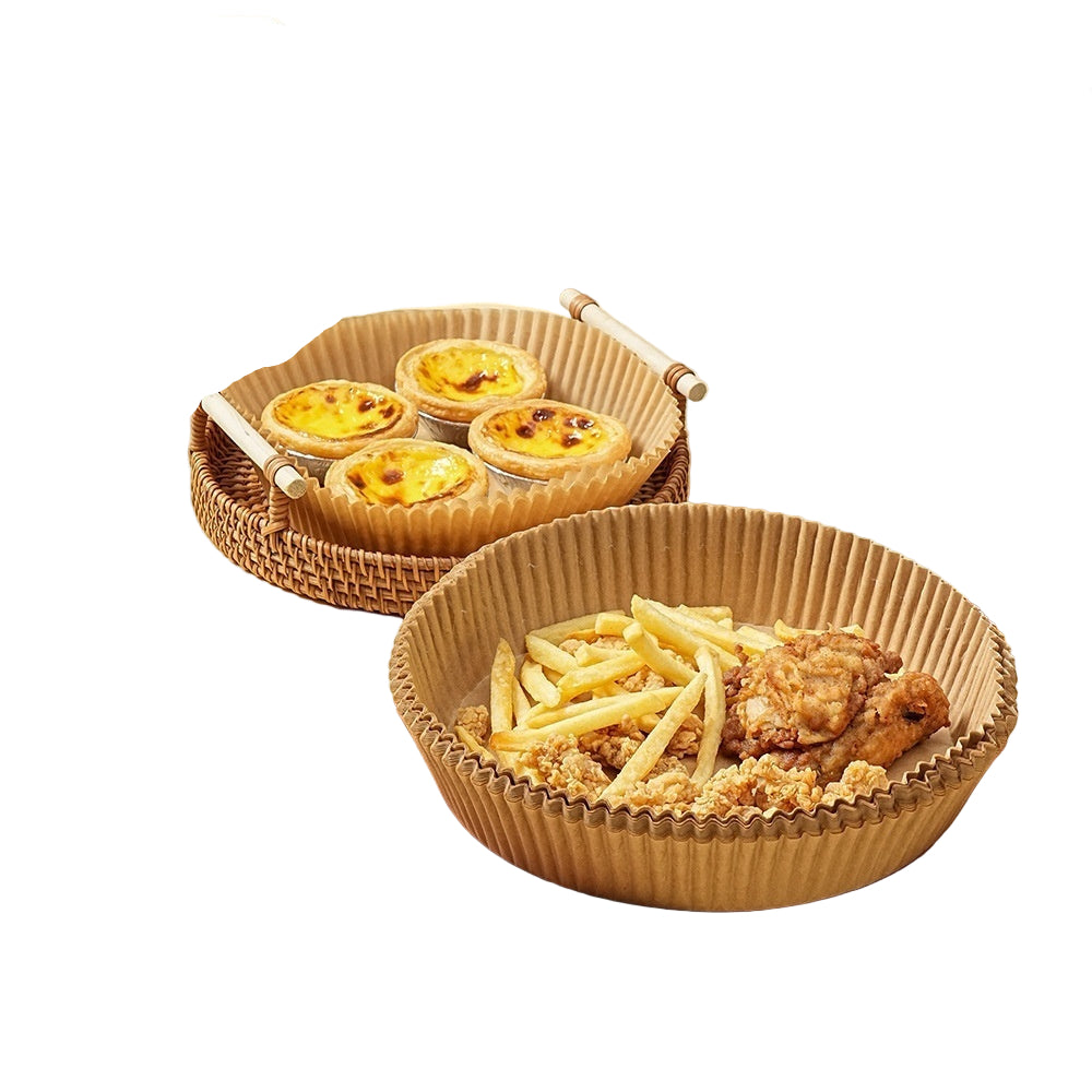 Thickened air fryer paper with food on a wooden board and wicker basket.