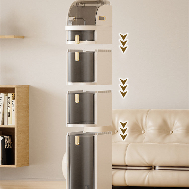 Modern kitchen appliance with a beige sofa and bookshelf in the background