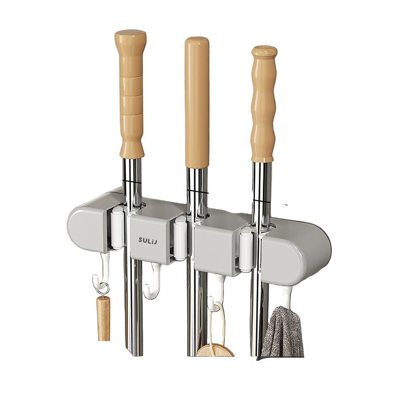 Set of three wooden-handled tools with measurement details on a gray wall background