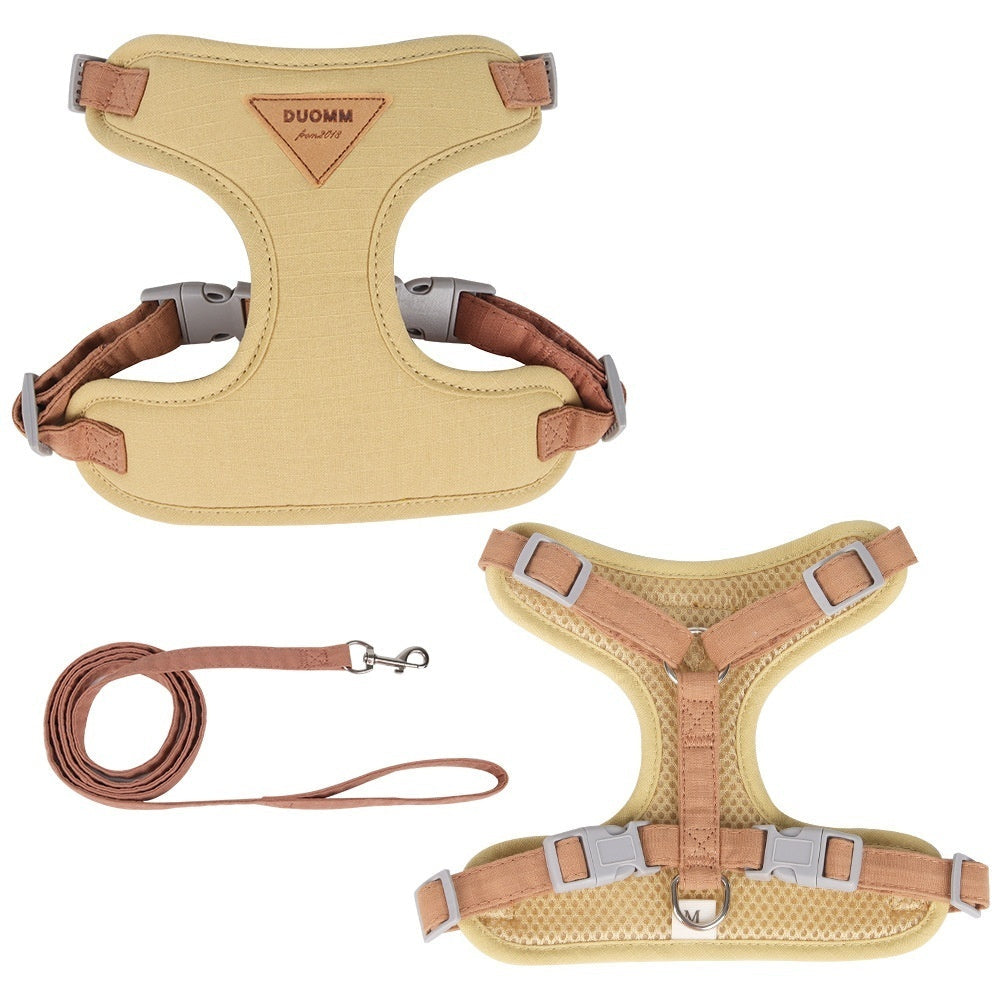Beige dog harness and leash set with DUOMM branding on a white background