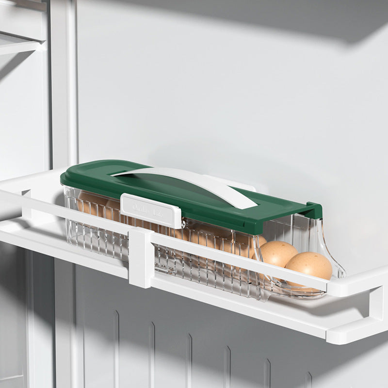 Egg holder with green lid and white base inside a refrigerator.