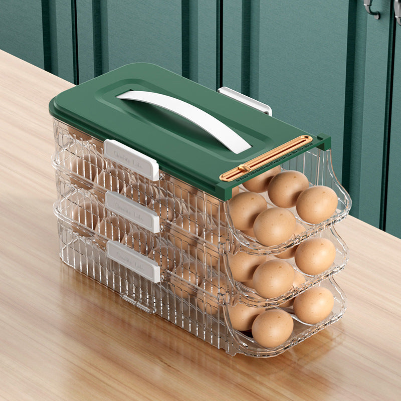Three-tier egg holder with green lid on a wooden surface