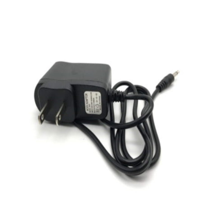 Black power adapter with a cable on a white background
