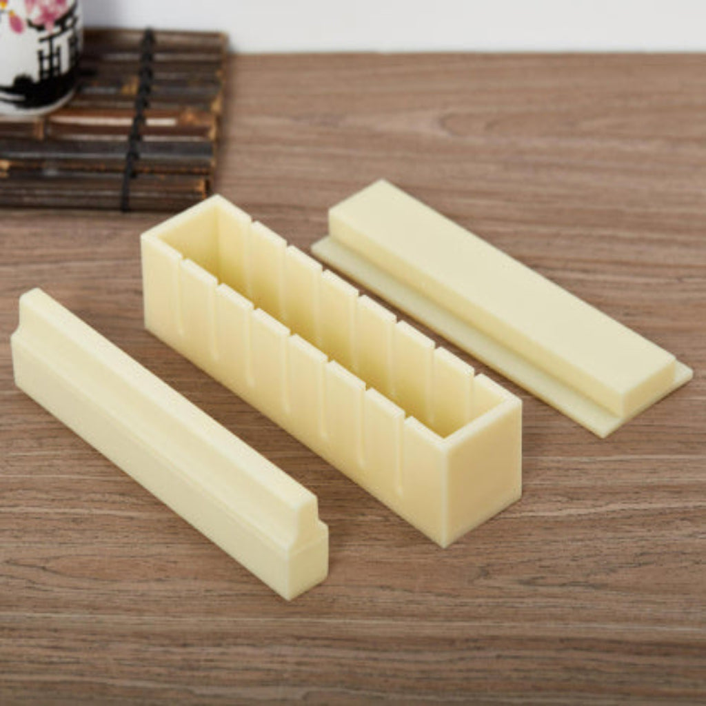 Set of three rectangular silicone molds on a wooden surface