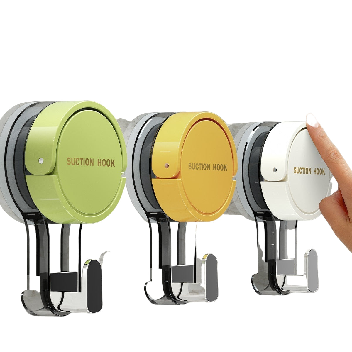 Three suction hooks in green, yellow, and white with text describing their features on a marble wall background.