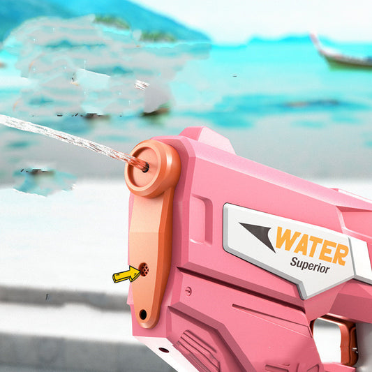 Pink water gun with 'Water Superior' text against a blurred water background