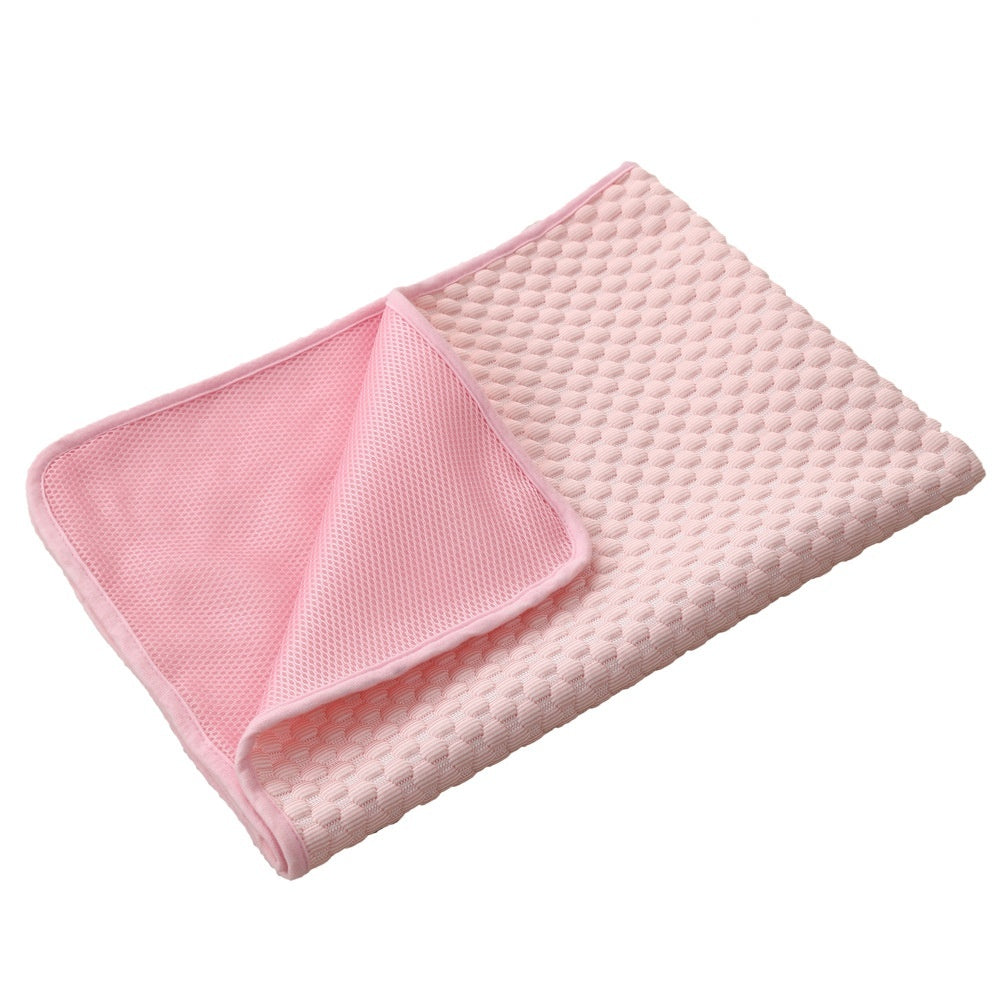 Pink textured blanket on a white background