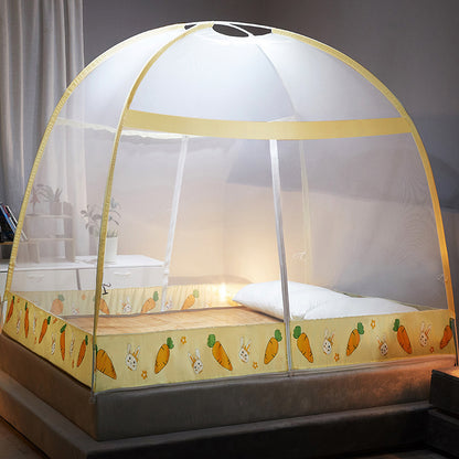 Children's bed with a yellow canopy featuring cartoon designs in a bedroom setting.