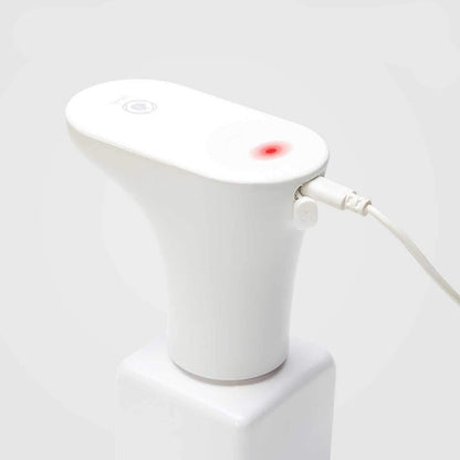 White electronic device with a rechargeable battery indicator on a light gray background