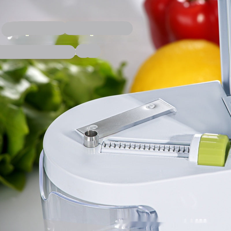 Vegetable chopper with imported sharp blade and vegetables in the background