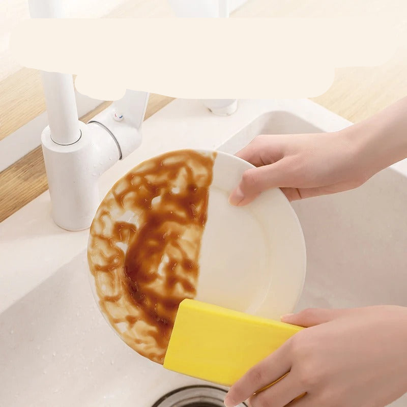 Person cleaning a greasy plate with a yellow sponge over a sink, with text 'Strong Cleaning Power' and 'Removes oil and grease easily'.