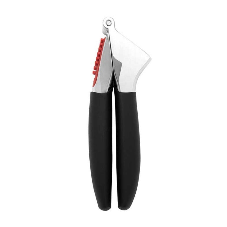 Garlic press with black handles and a silver head on a white background